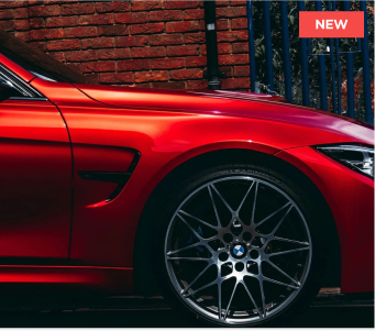 Photo of red car on road